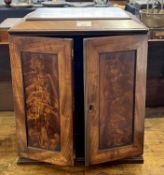 Georgian mahogany table top cabinet with two doors opening to an interior with small pull out