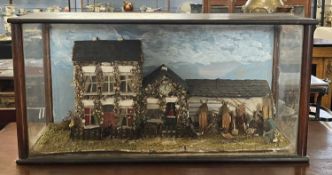 Unusual late 19th/early 20th century cased diorama of a farmhouse with accompanying outbuilding with