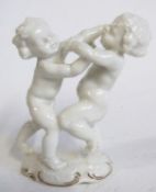 A Hutschenreuther model of two cherubs wrestling, modelled by Karl Tutter