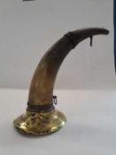 Brass mounted cow horn