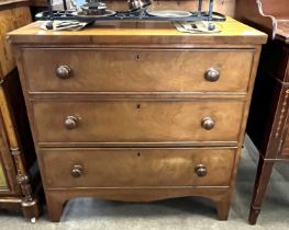 A Victorian mahogany chest of three drawers, fitted with turned knob handles, 87cm wide