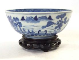 19th Century Chinese porcelain bowl with blue and white design in Kangxi style, four character