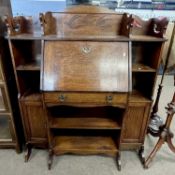 Late 19th century oak bureau bookcase in the Arts & Crafts taste, with central drop down front