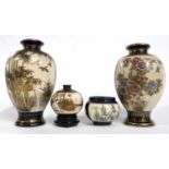 A group of Satsuma ware vases of baluster shape with gilt decoration of birds amongst branches