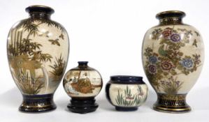 A group of Satsuma ware vases of baluster shape with gilt decoration of birds amongst branches