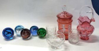 Group of glass wares including a ruby coloured glass jar and cover with painted Mary Gregory style