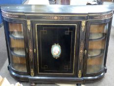 Victorian ebonised and brass mounted credenza cabinet with central porcelain panel, 149cm wide
