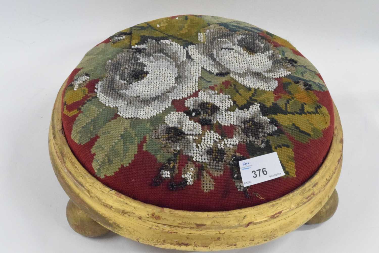 A Victorian embroidered footstool in circular gilt wooden frame - Image 3 of 4