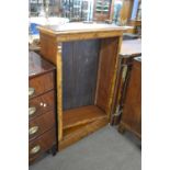 A Victorian and later walnut veneered bookcase cabinet with adjustable shelves and a plinth base,