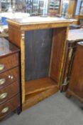 A Victorian and later walnut veneered bookcase cabinet with adjustable shelves and a plinth base,