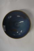 A Song Dynasty style bowl with a dark blue flambe type glaze 18cm diameter