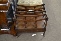 Mahogany Canterbury magazine rack of typical form with four section top over a base drawer and