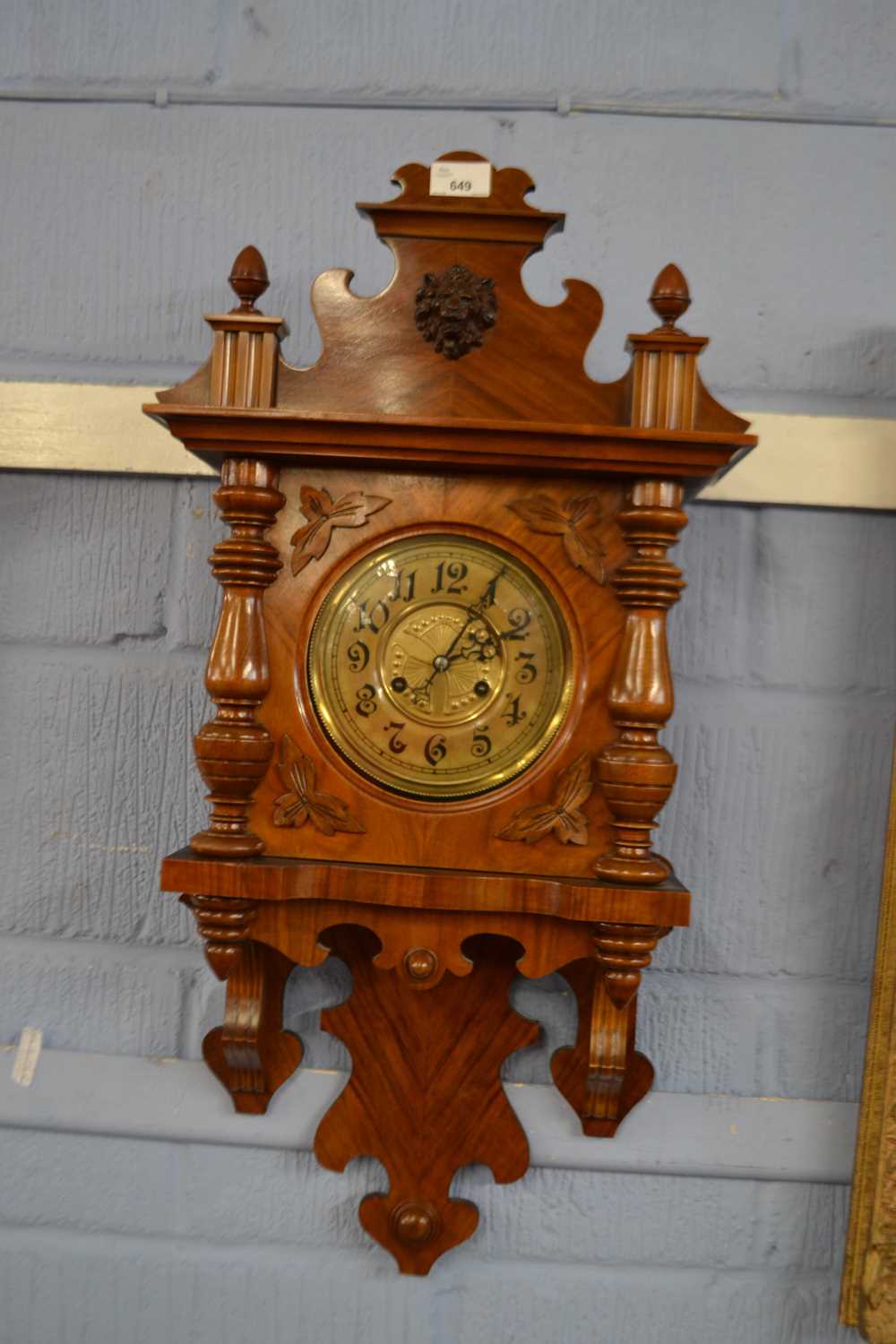 Late 19th or early 20th Century continental walnut cased wall clock set in an architectural case