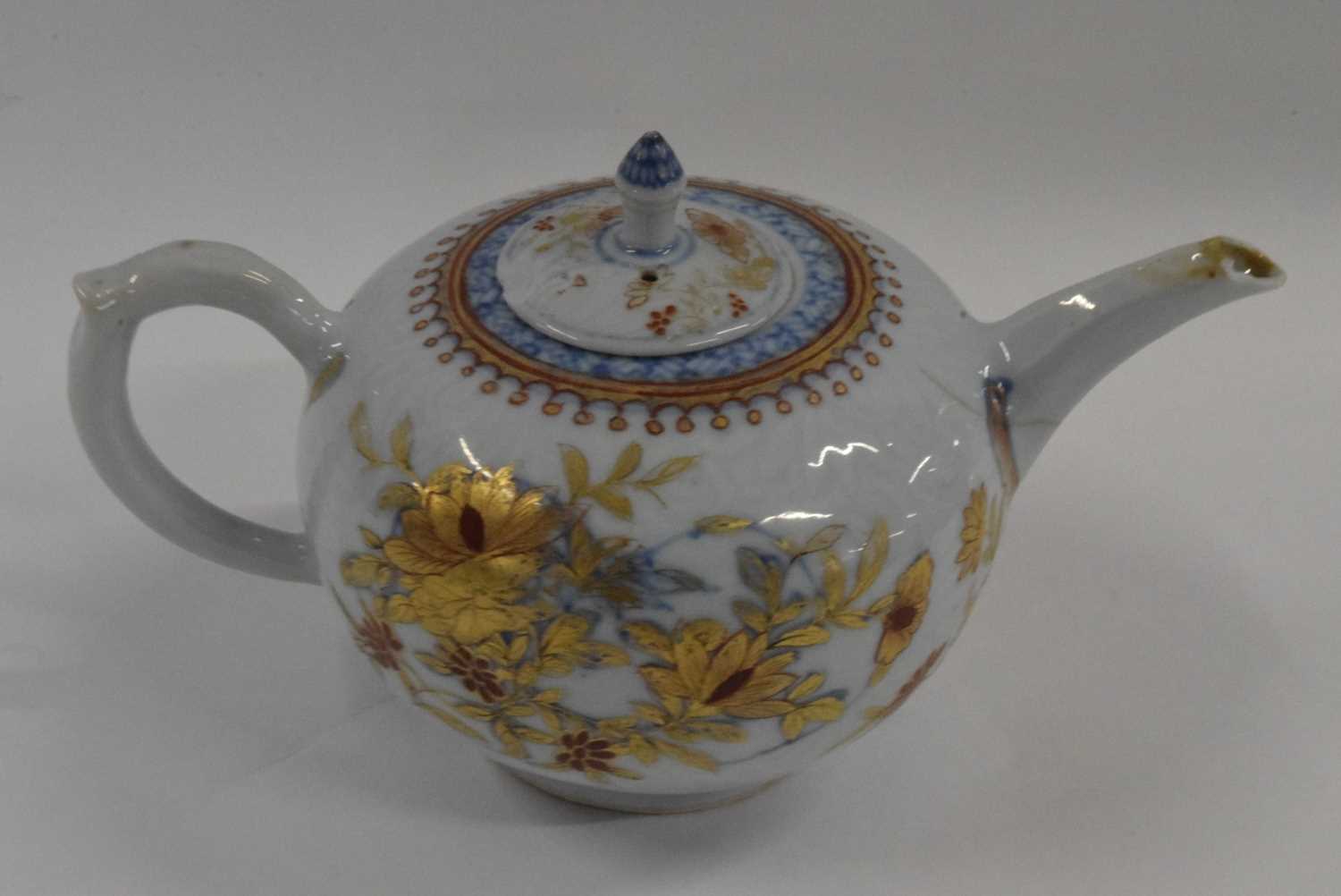 An 18th Century Chinese porcelain teapot and cover with an Imari design (chips to spout, handle - Image 3 of 4