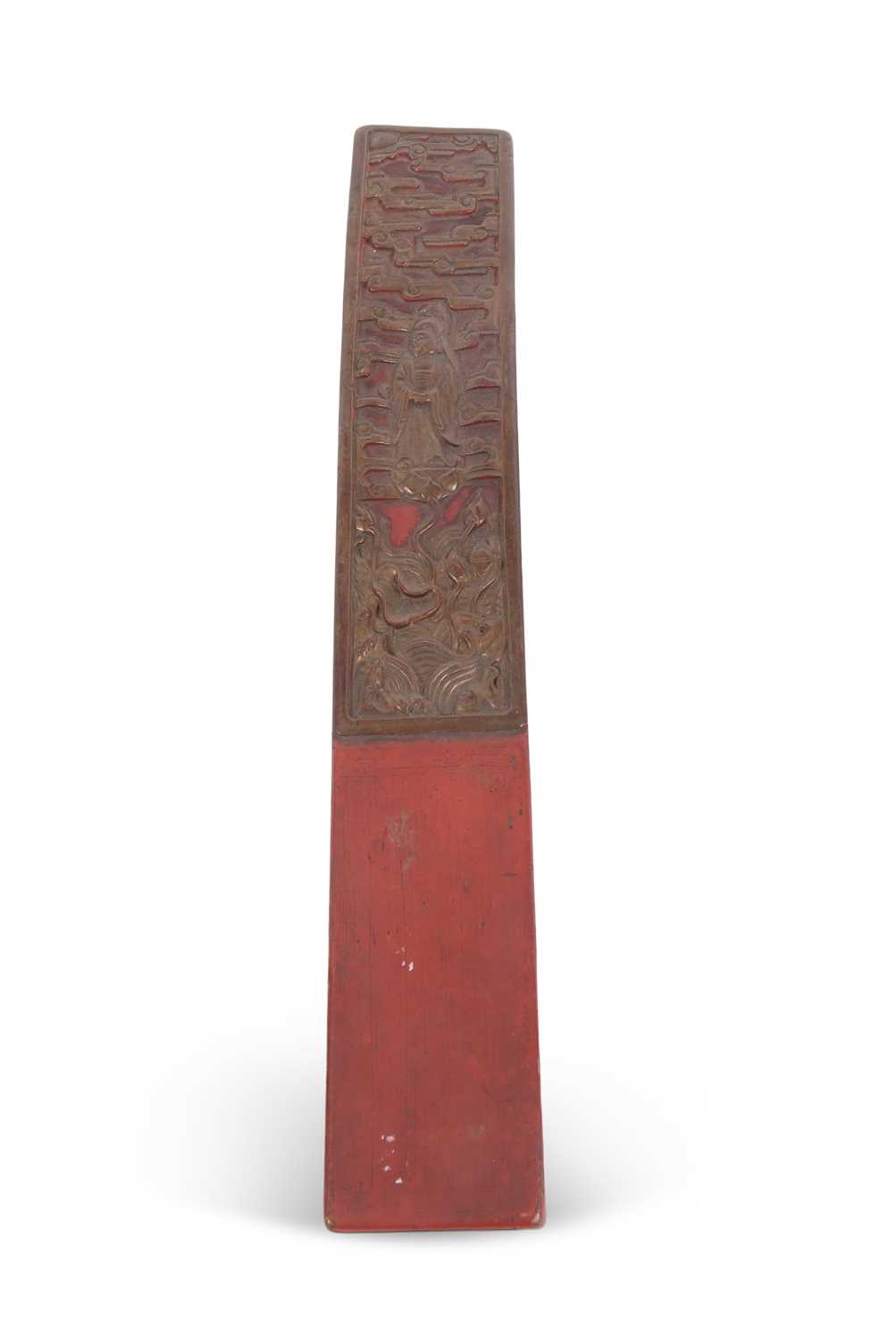 A wooden Priests sleeve carved with a Chinese dignitary amongst flowers, 43cm long