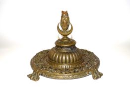 Late 19th Century cast metal ink well, the finial modelled as an owl with metal scroll work borders,