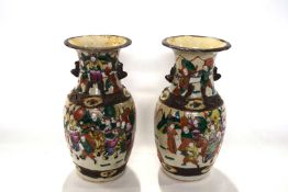 A pair of Chinese crackle ware vases, late 19th Century with designs of Chinese figures in famille