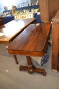 Mid 19th Century rosewood centre or library table of rectangular form raised on turned columns