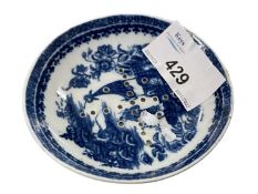 A Caughley egg strainer with blue printed fisherman pattern