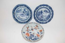 A Chinese porcelain dish, 18th Century with an Imari design together with two plates, 23cm diameter