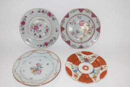A group of three 18th Century Chinese porcelain plates with famille rose designs (a/f)