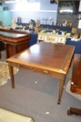 Large late 19th or early 20th Century American walnut framed writing table with brown leather