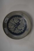 A small dish with a Ming type design, 19cm diameter