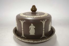 A 19th Century pottery Stilton cheese dish and cover, in Wedgwood style with applied decoration