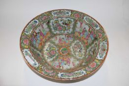 A 19th Century Cantonese porcelain large bowl with famille vert/rose designs of Chinese figures