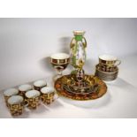 A group of Royal Crown Derby wares including six coffee cans and saucers, further small goblet,