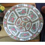 A large Cantonese porcelain bowl with a famille rose/vert design of floral sprays, 40cm diameter