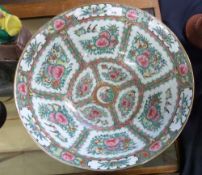 A large Cantonese porcelain bowl with a famille rose/vert design of floral sprays, 40cm diameter