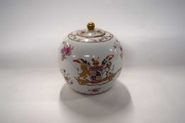 A very large 20th Century Chinese jar and cover decorated with Royal Arms of George III with famille