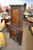 Late 19th Century carved oak two tier corner cabinet with inlaid decoration