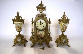 Early 20th Century clock garniture with French style sevre decoration (printed) with brass mounts