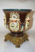 A 19th Century Maiolica style jardiniere, probably French, on metal mask head mounts