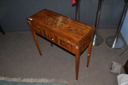 A 19th Century Dutch fold top table with side drawers, extensively inlaid with floral detail,