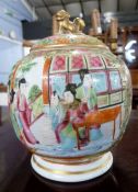 A 19th Century Cantonese porcelain jar and cover with polychrome design of Chinese figures, the