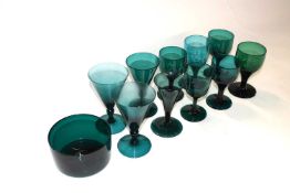 A collection of Bristol green glass, 19th Century including eight glasses of mainly trumpet shape