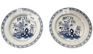 Two rare small Lowestoft plates or stands with Chinoiserie design of fence rockwork and trees,