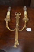 A single 20th Century cast gilt brass double wall light with ribbon and tassle decoration, 40cm