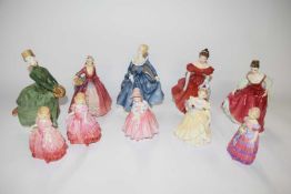 A group of Royal Doulton figurines including two copies of Rose HN1268, Winsome, Janet and others (