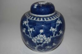 A Chinese porcelain vase of flattened ovoid form, decorated with floral designs (a/f) together