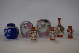 A group of Japanese porcelain wares including four small Kutani vases, further pair of vases, a