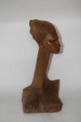 Carved figure of a tribal head in Haganeur style, 50cm high