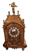 Early 20th Century mantel clock with German chiming movement, the case with faux marquetry
