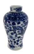 A Chinese porcelain vase, 19th Century with blue and white design of dragons chasing the flaming