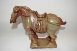 A Tang style horse on rectangular base