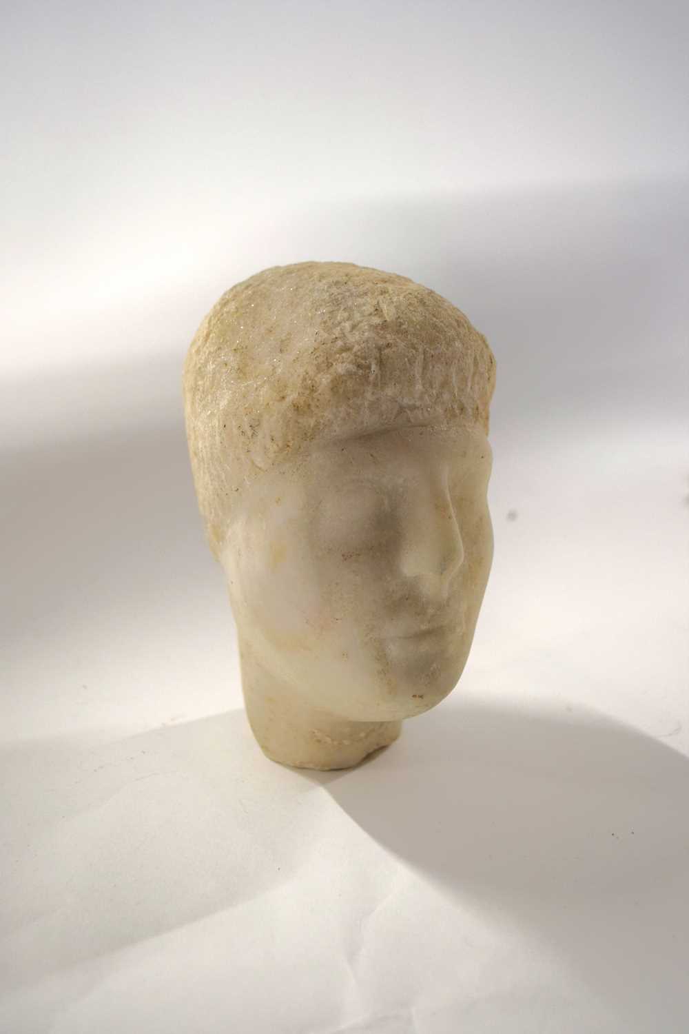 A marble head of a young boy, probably Roman - Image 2 of 4