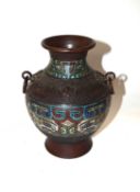 A Chinese metal vase with a Cloisonne type design, 25cm high